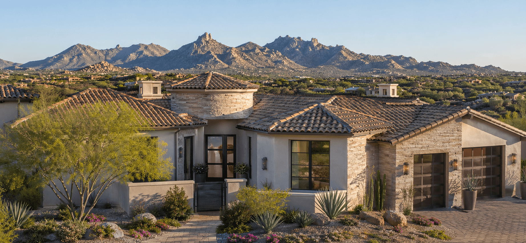 Scottsdale-area home with tile roof and mountain backdrop.